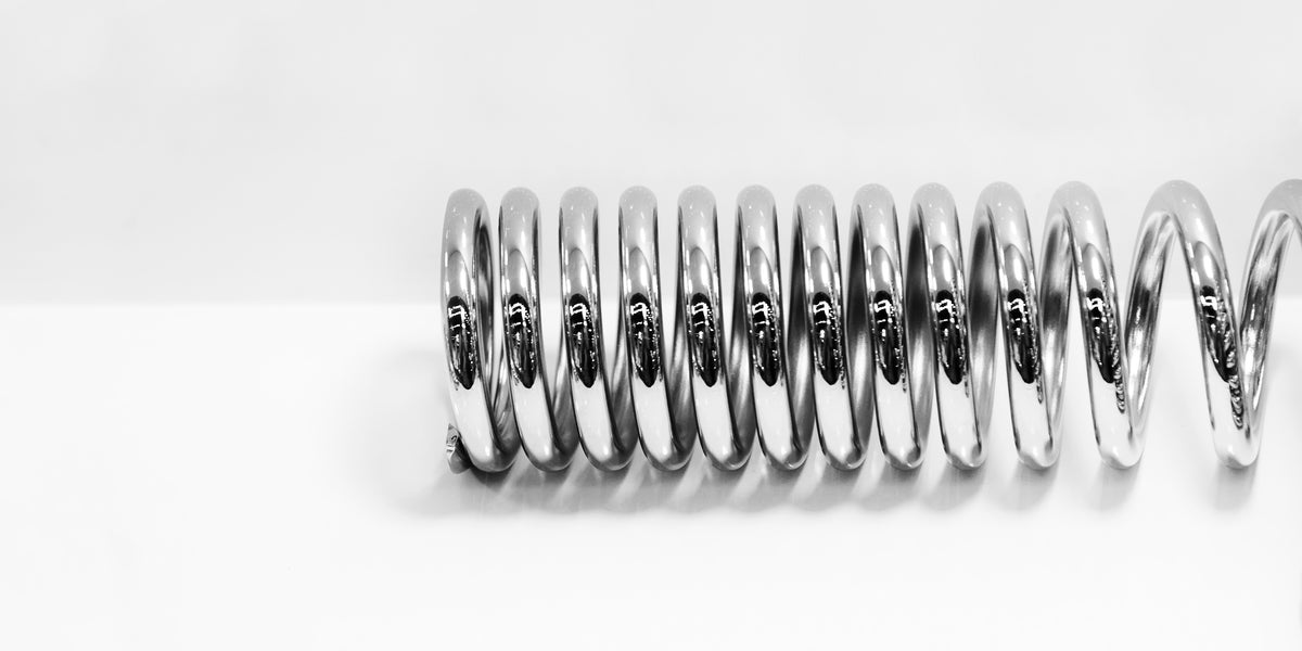 Hand Compressing Spring SpringXpert - Your Guide to Choosing and Understanding Compression Springs